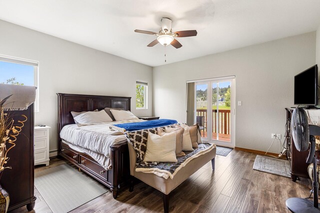 207 Cyprus Dr, Butte, MT 59701 - bedroom featuring access to outside, wood finished floors, baseboard heating, a ceiling fan, and baseboards
