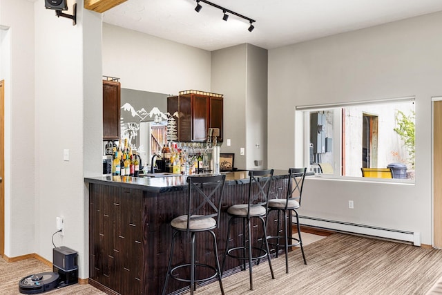 207 Cyprus Dr, Butte, MT 59701 - indoor bar featuring baseboard heating and track lighting