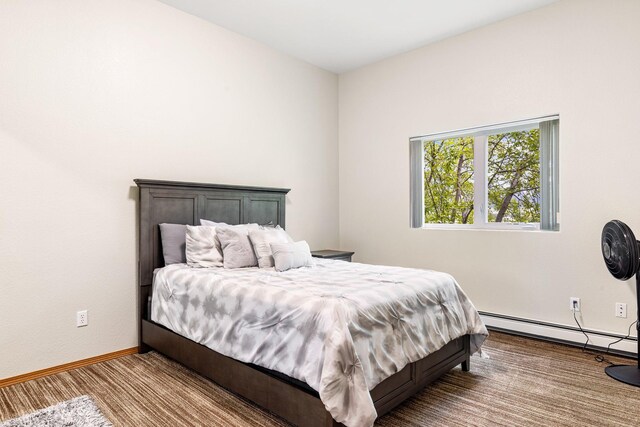207 Cyprus Dr, Butte, MT 59701 - bedroom with a baseboard heating unit and baseboards