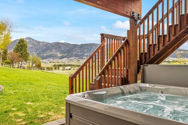 207 Cyprus Dr, Butte, MT 59701 - wooden deck with stairs, a hot tub, and a mountain view