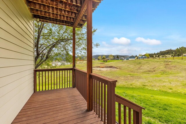 207 Cyprus Dr, Butte, MT 59701 - wooden terrace featuring a yard