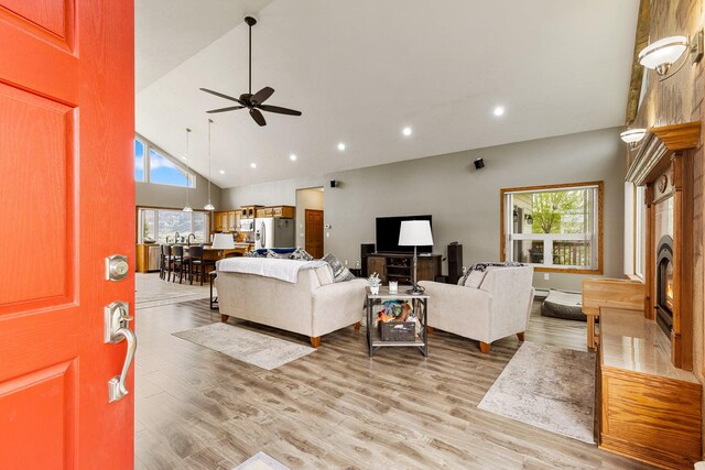 207 Cyprus Dr, Butte, MT 59701 - living room featuring ceiling fan, light wood-style flooring, recessed lighting, and high vaulted ceiling