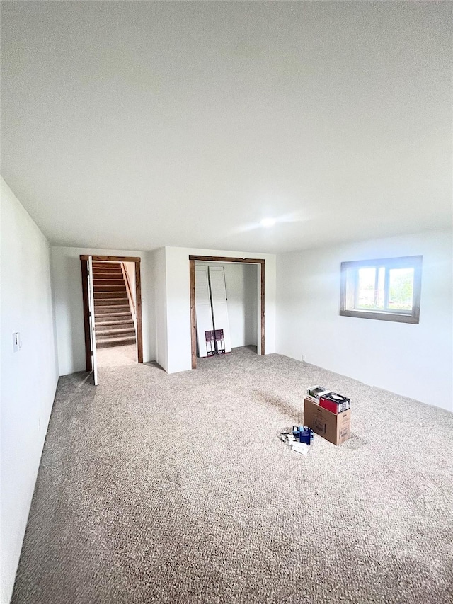 1807 1st St E, Polson, MT 59860 - carpeted empty room featuring stairs