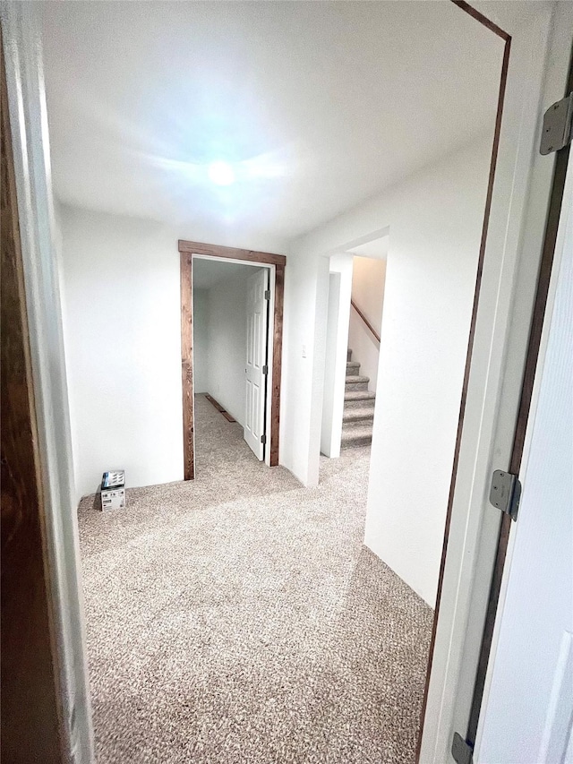 1807 1st St E, Polson, MT 59860 - carpeted empty room with stairs