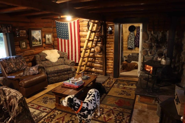 127 Lonely Moose Ln, Alberton, MT 59820 - living area featuring log walls and beamed ceiling