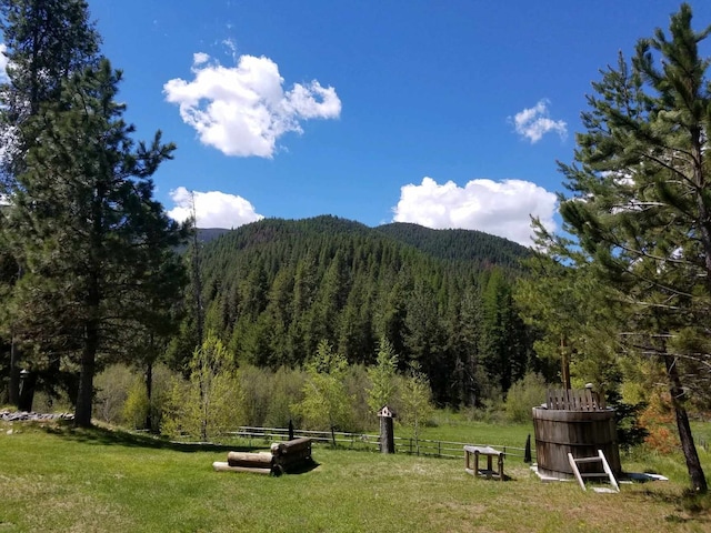 127 Lonely Moose Ln, Alberton, MT 59820 - view of mountain background with a heavily wooded area