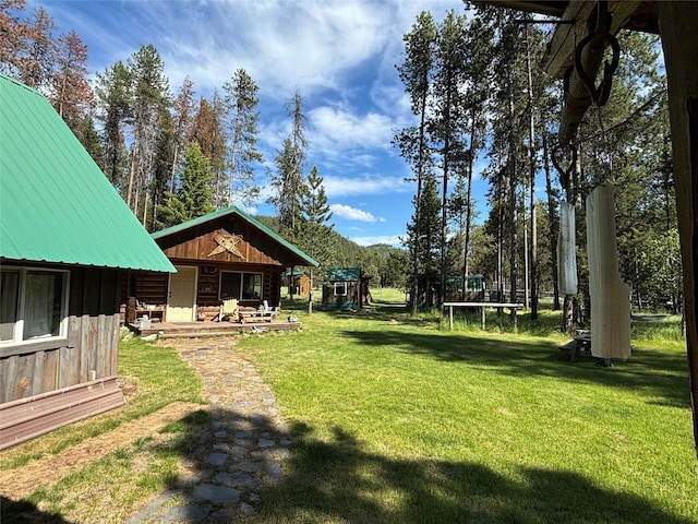 127 Lonely Moose Ln, Alberton, MT 59820 - view of green lawn featuring a playground