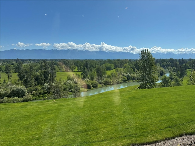 215 Somerset Dr, Kalispell, MT 59901 - view of mountain backdrop with a nearby body of water