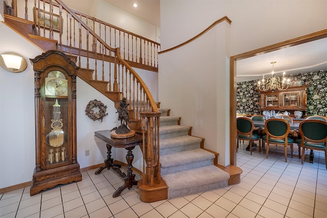 215 Somerset Dr, Kalispell, MT 59901 - stairs featuring a chandelier, tile patterned floors, and baseboards