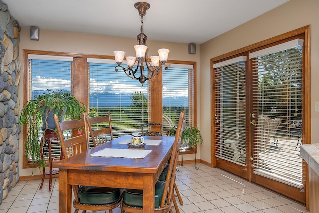 215 Somerset Dr, Kalispell, MT 59901 - dining space featuring light tile patterned flooring and a chandelier
