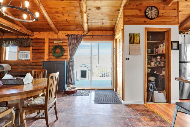 5 Lake Flat Ln, Great Falls, MT 59404 - dining room with wood ceiling with exposed beams, a chandelier, and baseboards