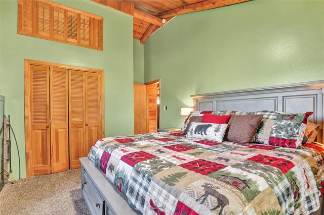 5 Lake Flat Ln, Great Falls, MT 59404 - bedroom featuring wooden ceiling with exposed beams, carpet floors, a closet, and high vaulted ceiling