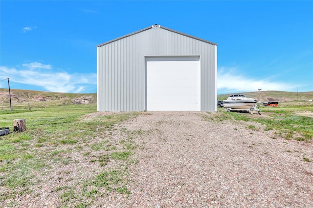5 Lake Flat Ln, Great Falls, MT 59404 - view of outdoor structure featuring a view of rural / pastoral area and driveway