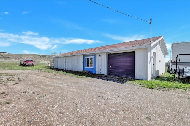 5 Lake Flat Ln, Great Falls, MT 59404 - detached garage with dirt driveway