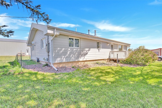 5 Lake Flat Ln, Great Falls, MT 59404 - rear view of house with a lawn
