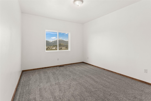 4452 Ludwig Ln, Stevensville, MT 59870 - spare room with carpet flooring and baseboards