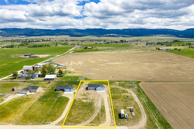 4452 Ludwig Ln, Stevensville, MT 59870 - aerial view of sparsely populated area with a mountain backdrop and property boundaries highlighted