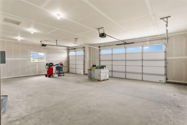 4452 Ludwig Ln, Stevensville, MT 59870 - garage with a garage door opener and electric panel
