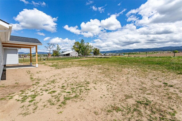 4452 Ludwig Ln, Stevensville, MT 59870 - view of yard with a view of countryside and a mountain view