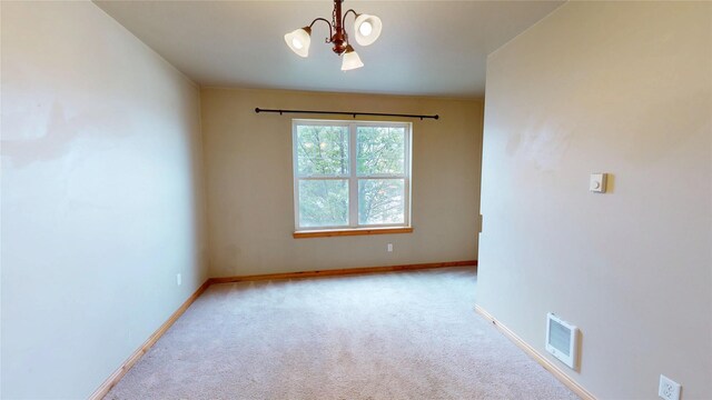 4100 Mullan Rd Unit 712, Missoula, MT 59808 - carpeted spare room with a chandelier and baseboards