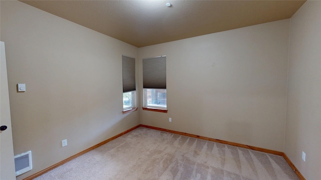 4100 Mullan Rd Unit 712, Missoula, MT 59808 - spare room featuring light colored carpet and baseboards
