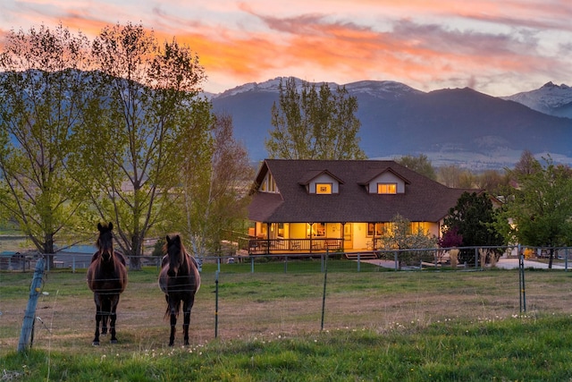 1892 Sutherland Ln, Corvallis, MT 59828 - rear view of property featuring a mountain view and covered porch