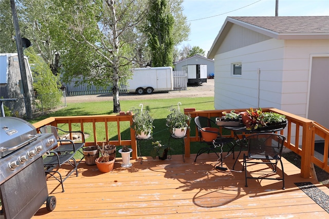 507 2nd St, Valier, MT 59486 - wooden terrace with a grill