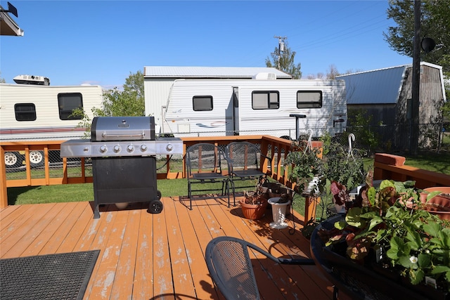 507 2nd St, Valier, MT 59486 - wooden deck featuring area for grilling