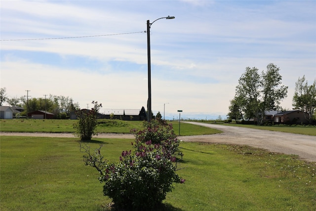 507 2nd St, Valier, MT 59486 - surrounding community featuring a lawn