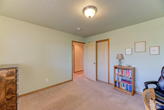 carpeted office with baseboards