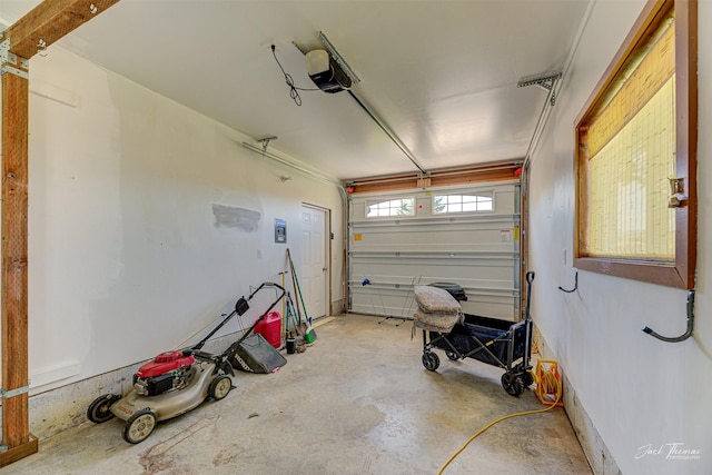 garage featuring a garage door opener