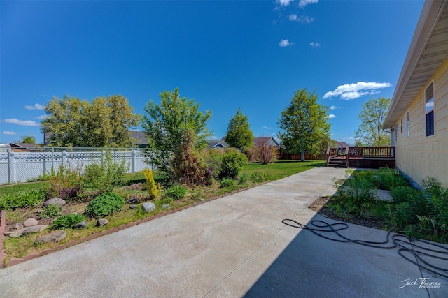 view of yard featuring a deck