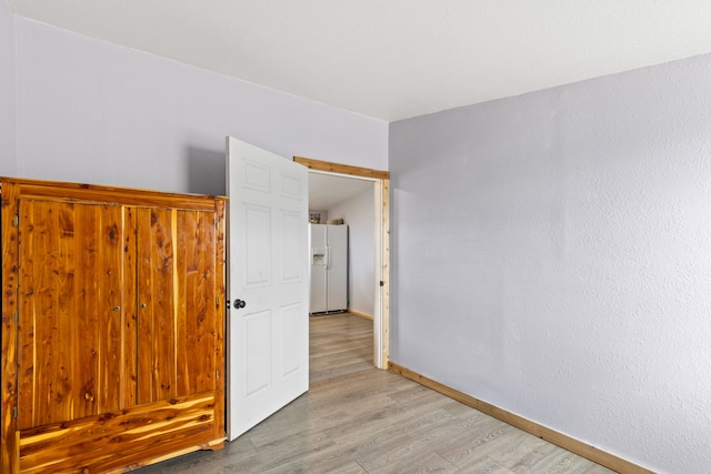 49 Embry Ln, Great Falls, MT 59404 - unfurnished room with light wood finished floors and baseboards