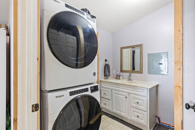 49 Embry Ln, Great Falls, MT 59404 - laundry room featuring stacked washer and clothes dryer and electric panel