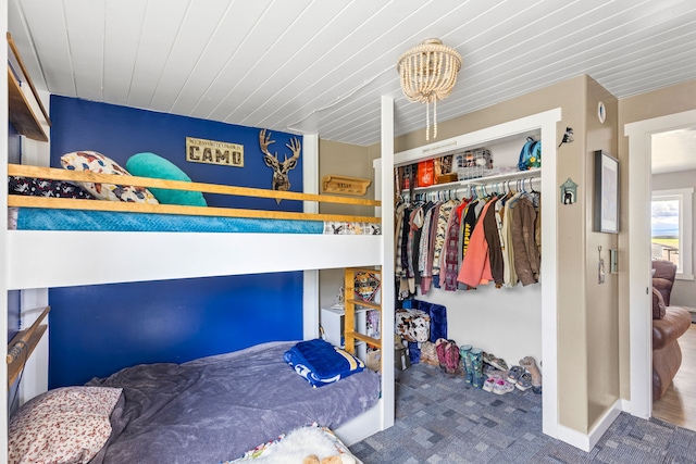 49 Embry Ln, Great Falls, MT 59404 - bedroom with carpet flooring, a chandelier, a closet, and wooden ceiling