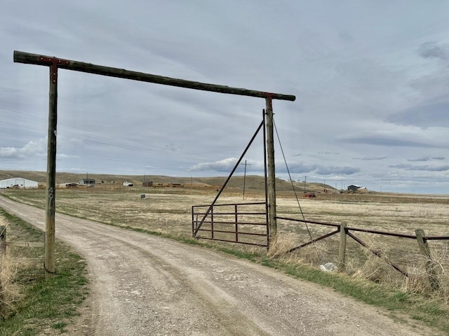 49 Embry Ln, Great Falls, MT 59404 - view of dirt / gravel driveway with a view of rural / pastoral area