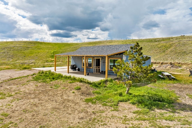 49 Embry Ln, Great Falls, MT 59404 - back of property featuring a patio