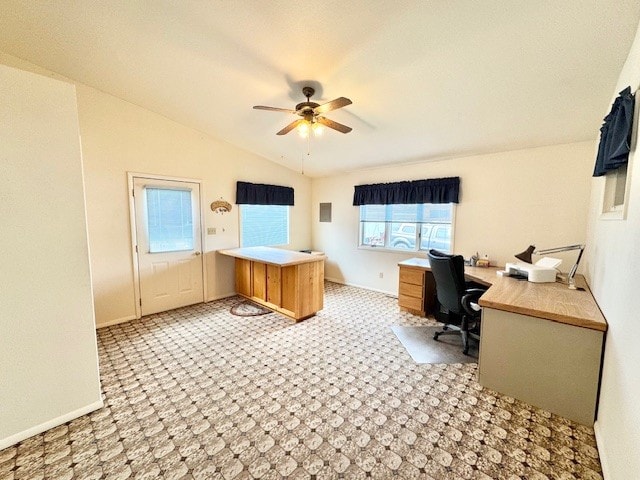 office space with ceiling fan, lofted ceiling, and baseboards