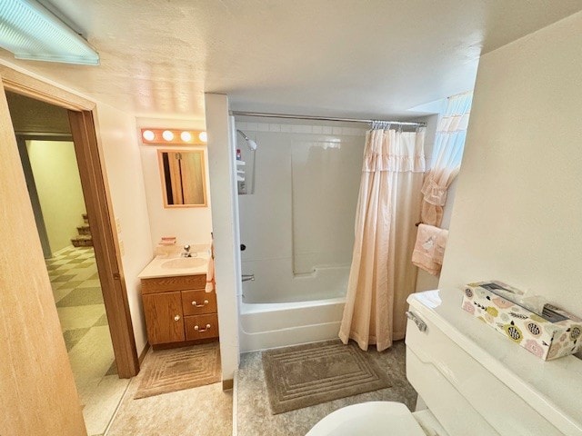 full bath featuring toilet, vanity, and shower / bath combination with curtain