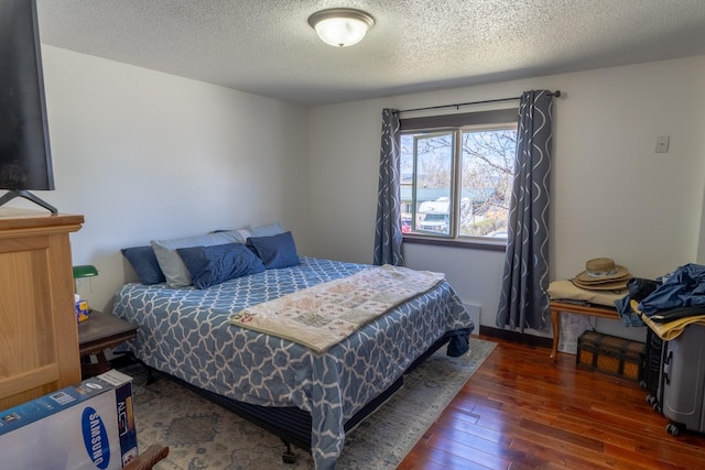1827 Hollins Ave, Helena, MT 59601 - bedroom featuring wood-type flooring and a textured ceiling