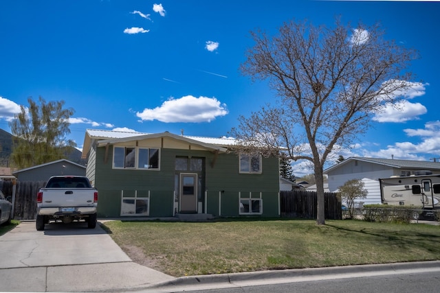 1827 Hollins Ave, Helena, MT 59601 - raised ranch with concrete driveway and metal roof