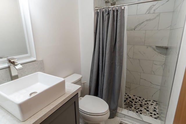 1827 Hollins Ave, Helena, MT 59601 - bathroom featuring a shower stall, toilet, and vanity
