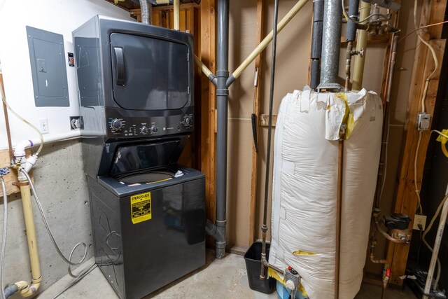 1827 Hollins Ave, Helena, MT 59601 - utility room featuring stacked washer and clothes dryer and electric panel