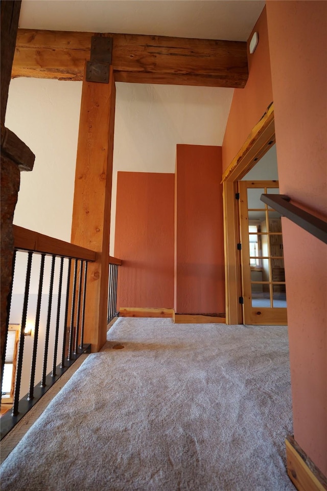237 N Monture Ct, Seeley Lake, MT 59868 - unfurnished room featuring beam ceiling and carpet floors
