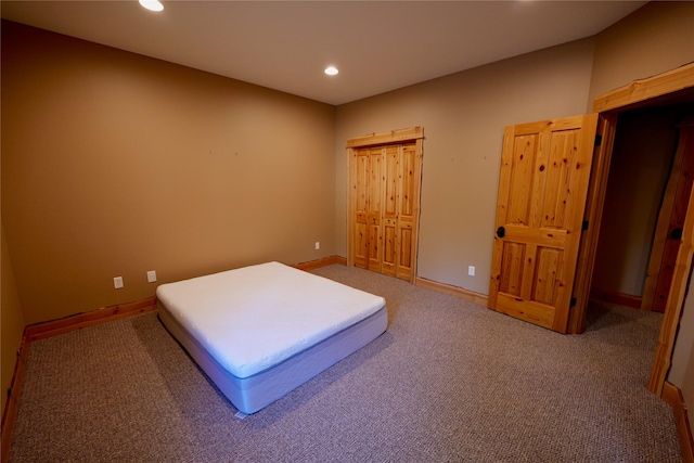 237 N Monture Ct, Seeley Lake, MT 59868 - carpeted bedroom with recessed lighting, baseboards, and a closet