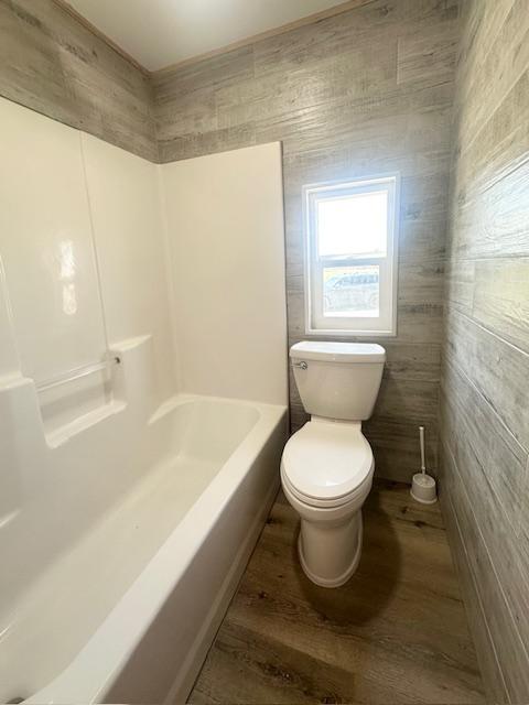 2900 S Montana St Unit 14, Butte, MT 59701 - full bathroom featuring wood finished floors and toilet