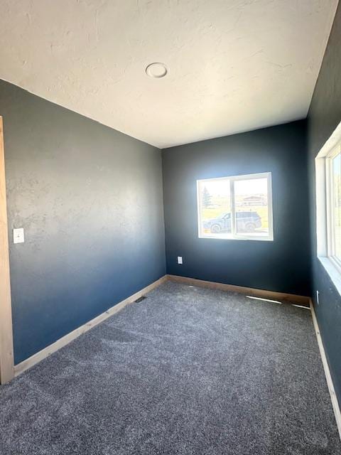 2900 S Montana St Unit 14, Butte, MT 59701 - unfurnished room featuring carpet floors and baseboards
