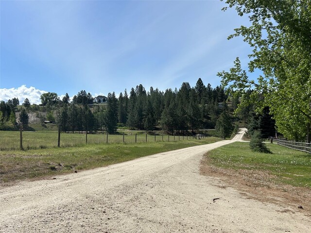 5061 Falcon Ln, Stevensville, MT 59870 - view of dirt / gravel road featuring a view of countryside