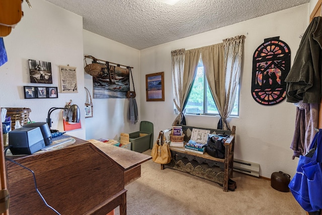 521 Clay St, Thompson Falls, MT 59873 - carpeted office space featuring a textured ceiling and a baseboard radiator