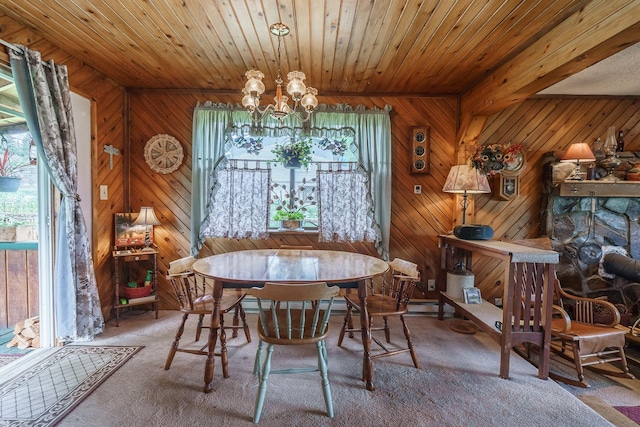 521 Clay St, Thompson Falls, MT 59873 - dining area with a chandelier, carpet flooring, wood walls, wood ceiling, and a baseboard radiator